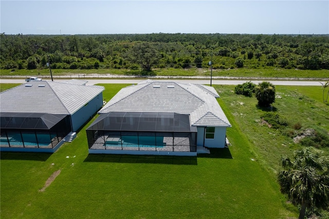 221 Rotonda Blvd S, Rotonda West, FL 33947 - aerial view of property and surrounding area featuring a heavily wooded area