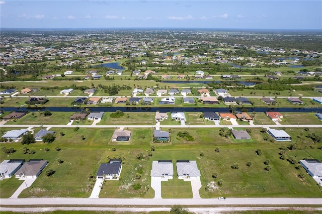 221 Rotonda Blvd S, Rotonda West, FL 33947 - aerial view of property's location featuring a large body of water and nearby suburban area
