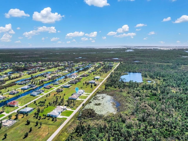 235 Rotonda Blvd S, Rotonda West, FL 33947 - birds eye view of property featuring a water view and a wooded view