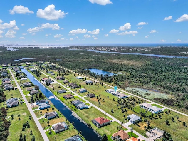 235 Rotonda Blvd S, Rotonda West, FL 33947 - aerial view with a residential view, a forest view, and a water view