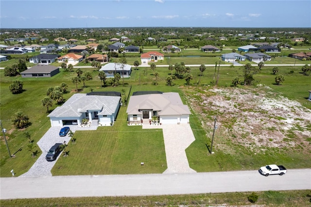 235 Rotonda Blvd S, Rotonda West, FL 33947 - aerial perspective of suburban area