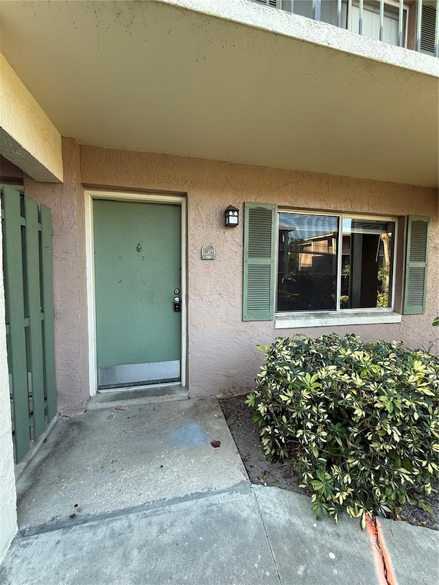 131 Water Front Way Unit 110, Altamonte Springs, FL 32701 - view of exterior entry with stucco siding