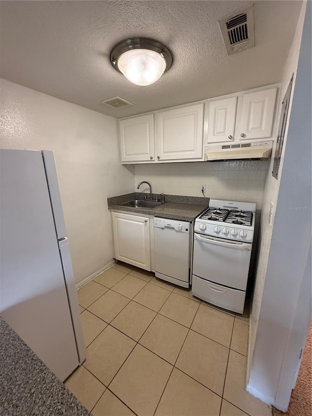 131 Water Front Way Unit 110, Altamonte Springs, FL 32701 - laundry area with a sink, light tile patterned floors, a textured ceiling, and visible vents