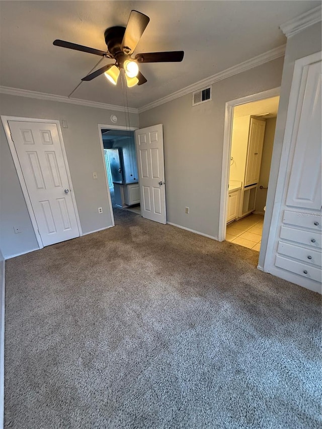 131 Water Front Way Unit 110, Altamonte Springs, FL 32701 - unfurnished bedroom featuring ceiling fan, light colored carpet, visible vents, ornamental molding, and ensuite bath