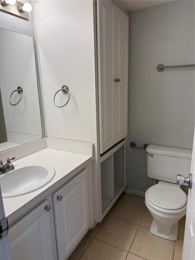 131 Water Front Way Unit 110, Altamonte Springs, FL 32701 - bathroom with tile patterned flooring, toilet, and vanity