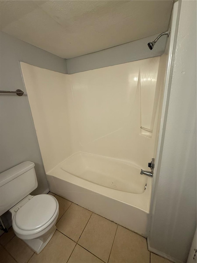 131 Water Front Way Unit 110, Altamonte Springs, FL 32701 - bathroom with shower / bathing tub combination, tile patterned floors, and toilet