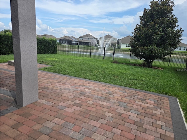 16124 Azure Key St, Winter Garden, FL 34787 - view of patio / terrace featuring a residential view and a water view