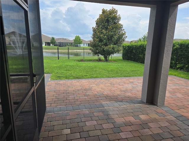 16124 Azure Key St, Winter Garden, FL 34787 - view of patio / terrace with a water view and a residential view
