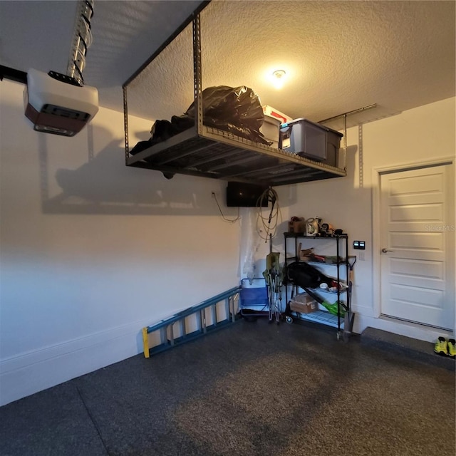16124 Azure Key St, Winter Garden, FL 34787 - garage featuring a garage door opener and baseboards