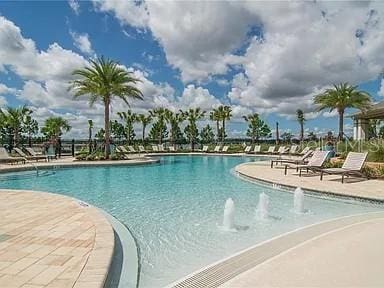 16124 Azure Key St, Winter Garden, FL 34787 - community pool featuring a patio area