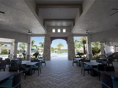16124 Azure Key St, Winter Garden, FL 34787 - view of patio / terrace featuring a ceiling fan and outdoor dining area