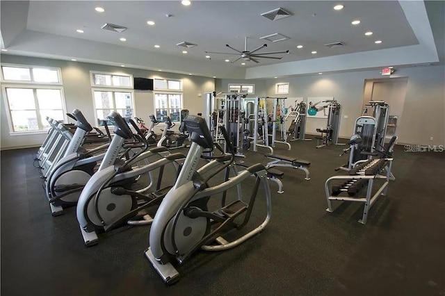 16124 Azure Key St, Winter Garden, FL 34787 - gym with a tray ceiling and recessed lighting