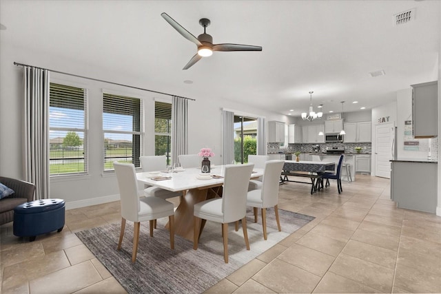 16124 Azure Key St, Winter Garden, FL 34787 - dining area with a chandelier, plenty of natural light, ceiling fan, light tile patterned floors, and recessed lighting