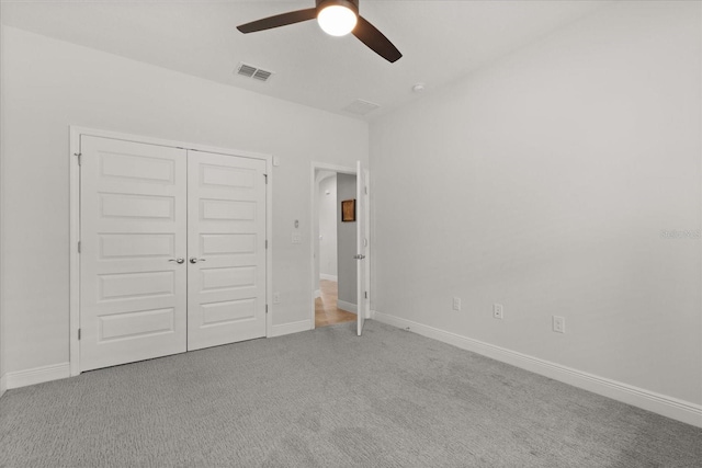 16124 Azure Key St, Winter Garden, FL 34787 - unfurnished bedroom with carpet, a closet, ceiling fan, and baseboards