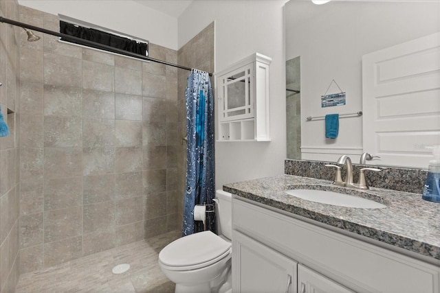 16124 Azure Key St, Winter Garden, FL 34787 - bathroom featuring toilet, vanity, and a tile shower