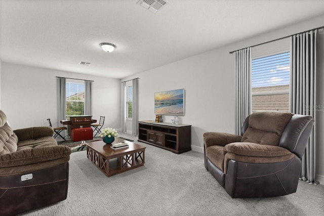 16124 Azure Key St, Winter Garden, FL 34787 - living room with light carpet and baseboards