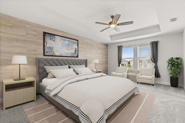 16124 Azure Key St, Winter Garden, FL 34787 - carpeted bedroom featuring a raised ceiling, baseboards, and a ceiling fan