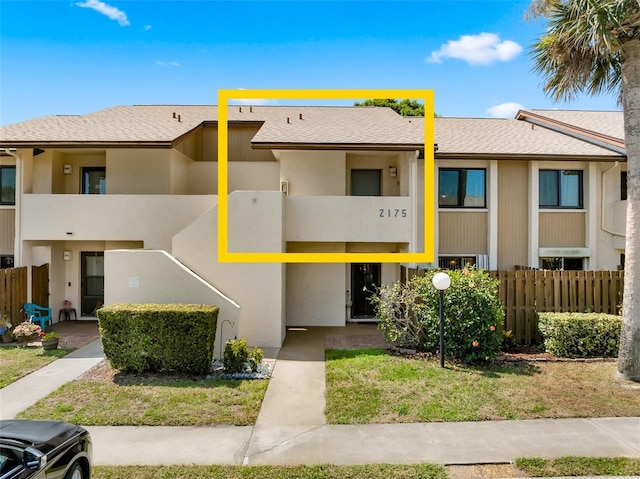2175 Golf Isle Dr Unit 1022, Melbourne, FL 32935 - view of building exterior featuring fence