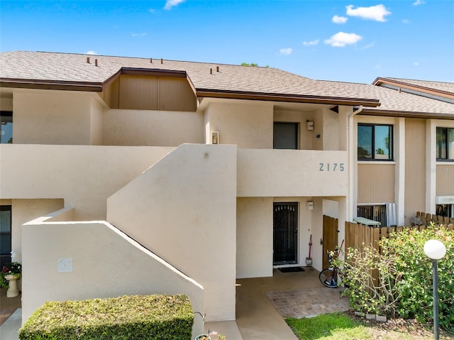 2175 Golf Isle Dr Unit 1022, Melbourne, FL 32935 - exterior space featuring a shingled roof and stucco siding
