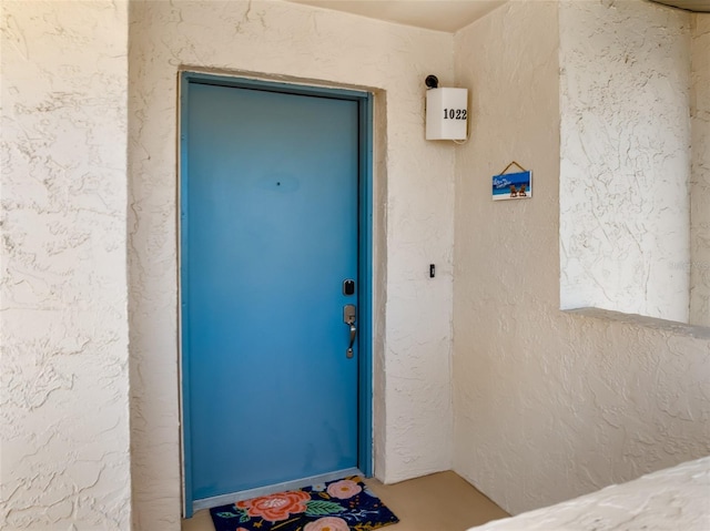 2175 Golf Isle Dr Unit 1022, Melbourne, FL 32935 - view of exterior entry featuring stucco siding