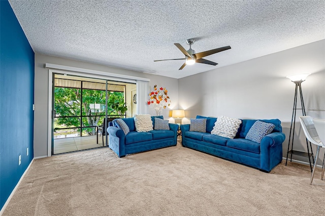 2175 Golf Isle Dr Unit 1022, Melbourne, FL 32935 - living room with baseboards, a ceiling fan, carpet, and a textured ceiling