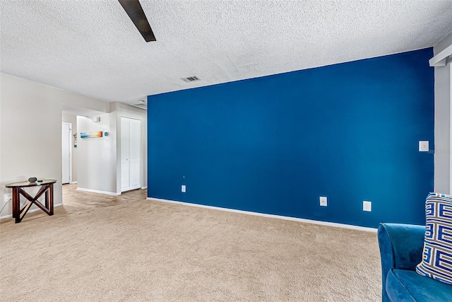2175 Golf Isle Dr Unit 1022, Melbourne, FL 32935 - interior space with baseboards, a textured ceiling, carpet, and a ceiling fan