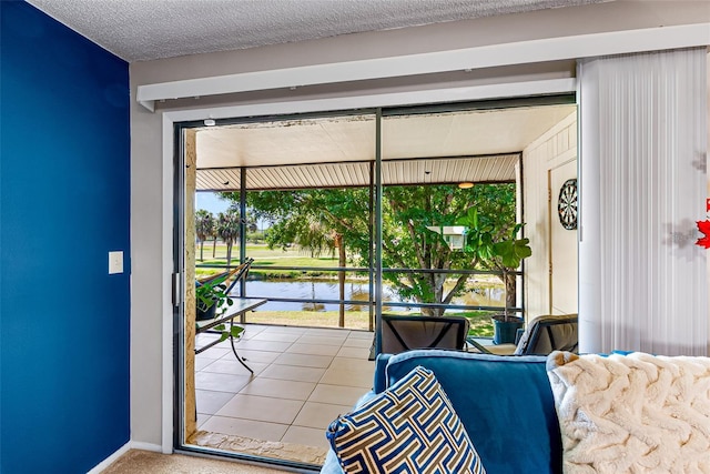 2175 Golf Isle Dr Unit 1022, Melbourne, FL 32935 - entryway with plenty of natural light, baseboards, and a water view