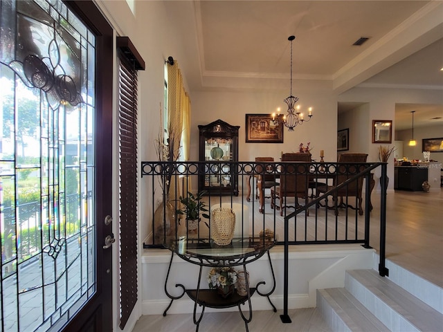 603 Sanctuary Golf Pl, Apopka, FL 32712 - interior space featuring ornamental molding, baseboards, a notable chandelier, and visible vents