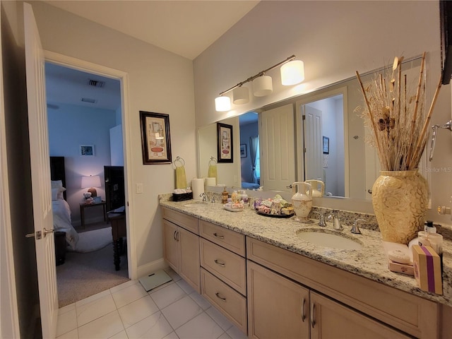603 Sanctuary Golf Pl, Apopka, FL 32712 - bathroom with tile patterned floors, ensuite bath, a sink, and double vanity