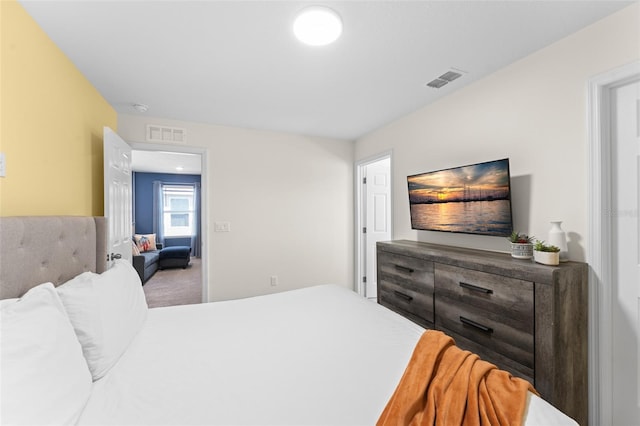bedroom with visible vents