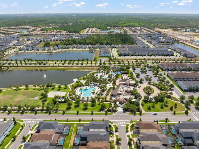 birds eye view of property featuring a residential view and a water view