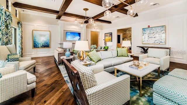 living area with wood finished floors, coffered ceiling, beam ceiling, and a decorative wall