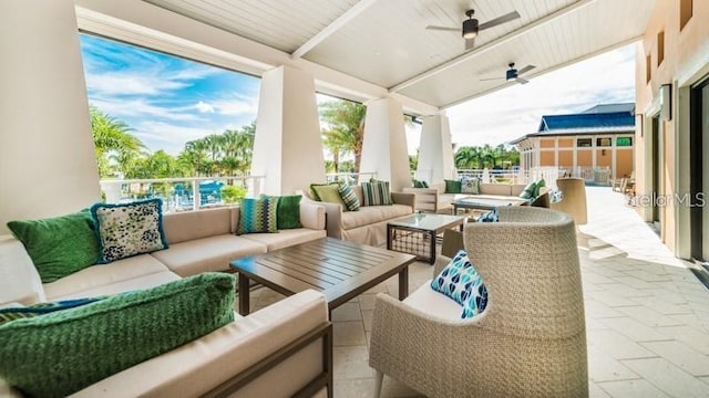 view of patio featuring an outdoor hangout area and a ceiling fan