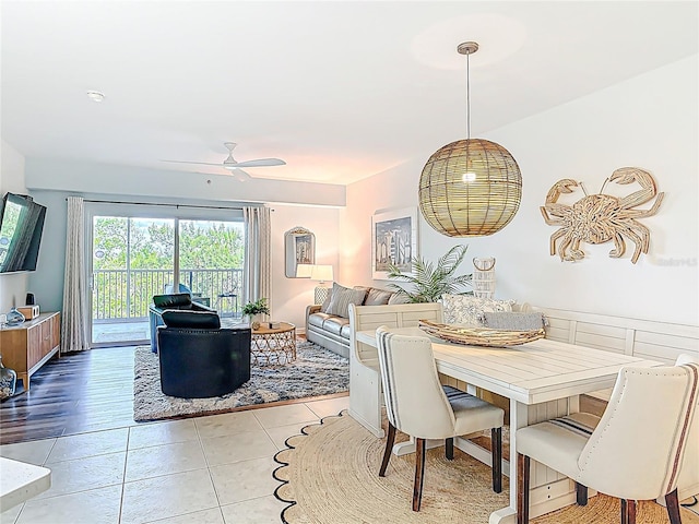 5300 S Atlantic Ave Unit 9-302, New Smyrna Beach, FL 32169 - dining space featuring a ceiling fan and light tile patterned floors