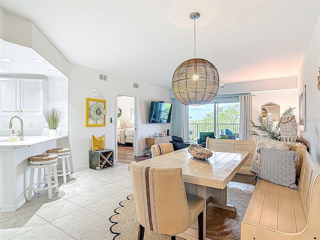 5300 S Atlantic Ave Unit 9-302, New Smyrna Beach, FL 32169 - dining room featuring baseboards, visible vents, recessed lighting, and light tile patterned flooring