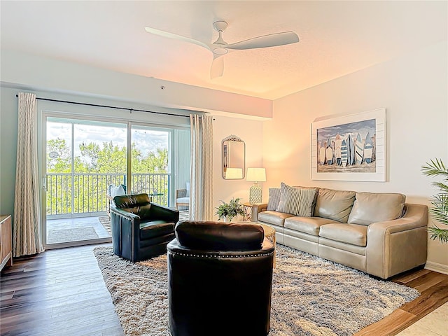 5300 S Atlantic Ave Unit 9-302, New Smyrna Beach, FL 32169 - living room featuring wood finished floors and ceiling fan