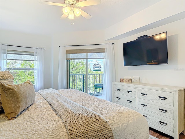 5300 S Atlantic Ave Unit 9-302, New Smyrna Beach, FL 32169 - bedroom with a ceiling fan, wood finished floors, access to outside, and multiple windows