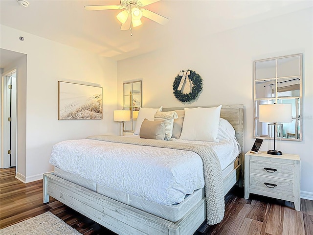 5300 S Atlantic Ave Unit 9-302, New Smyrna Beach, FL 32169 - bedroom with baseboards, a ceiling fan, and wood finished floors