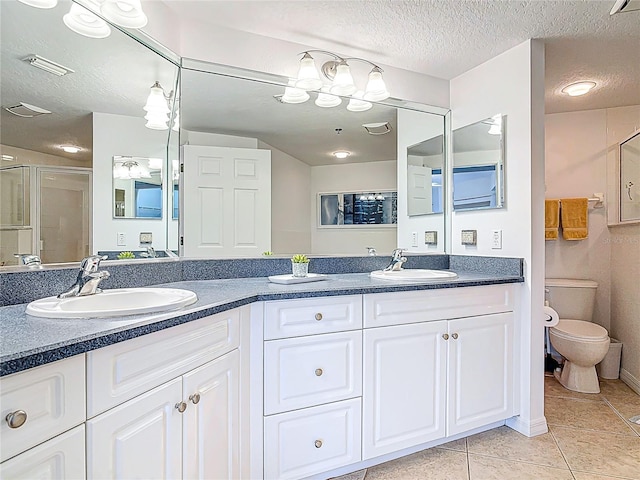 5300 S Atlantic Ave Unit 9-302, New Smyrna Beach, FL 32169 - bathroom featuring tile patterned floors, a sink, and double vanity