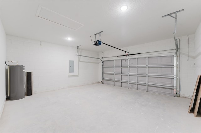 garage with concrete block wall, electric panel, water heater, and a garage door opener