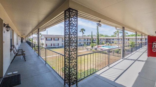 view of patio / terrace with a balcony
