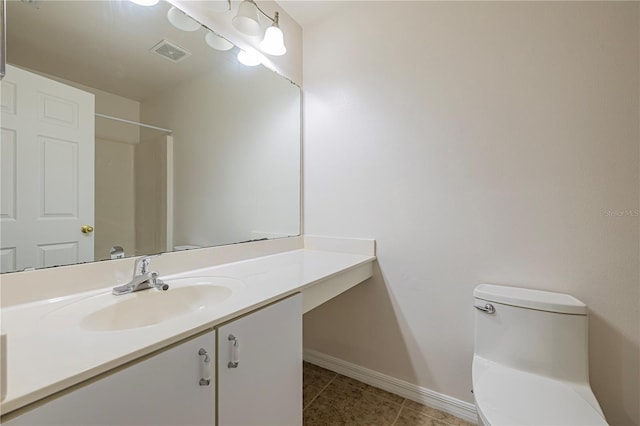 50989 Hwy 27 Unit 371, Davenport, FL 33897 - bathroom with toilet, baseboards, vanity, and tile patterned floors