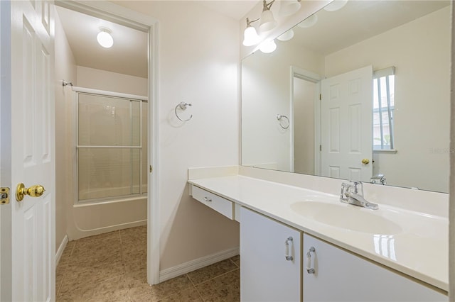 50989 Hwy 27 Unit 371, Davenport, FL 33897 - full bath with baseboards, vanity, shower / bath combination with glass door, and tile patterned floors