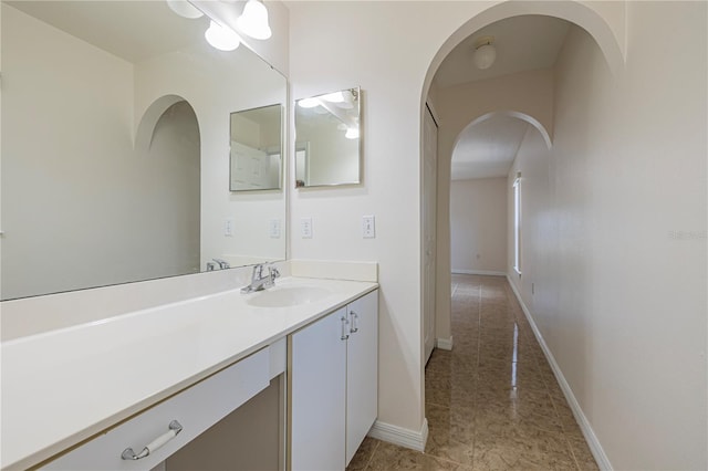 50989 Hwy 27 Unit 371, Davenport, FL 33897 - bathroom with vanity, baseboards, and tile patterned flooring