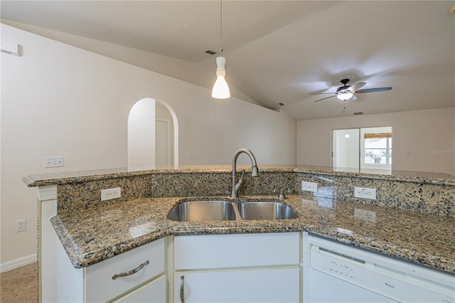 50989 Hwy 27 Unit 371, Davenport, FL 33897 - kitchen with white dishwasher, a sink, stone counters, vaulted ceiling, and a ceiling fan