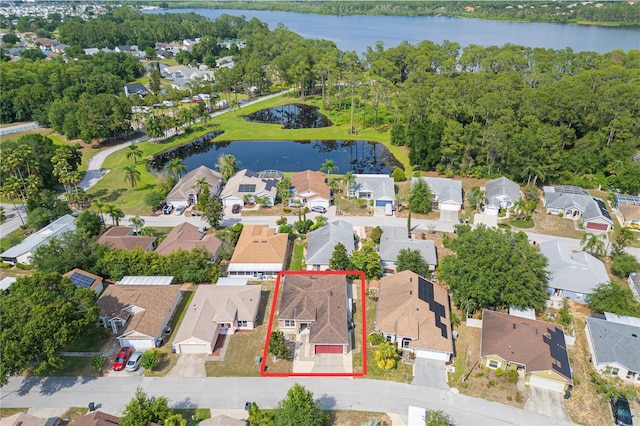 50989 Hwy 27 Unit 371, Davenport, FL 33897 - aerial view of residential area featuring a nearby body of water and property boundaries highlighted