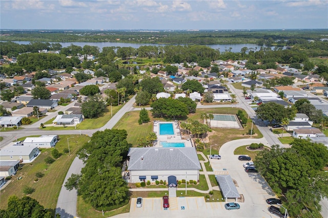 50989 Hwy 27 Unit 371, Davenport, FL 33897 - aerial view of property's location featuring a large body of water, a pool area, and nearby suburban area