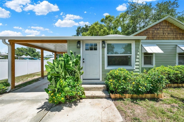 508 10th St, Saint Cloud, FL 34769 - view of front of house with an attached carport