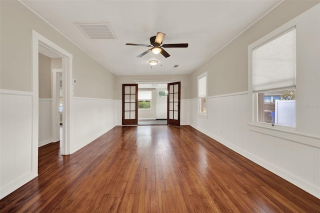 508 10th St, Saint Cloud, FL 34769 - unfurnished room featuring a ceiling fan, wainscoting, and wood-type flooring