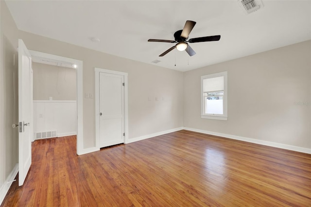 508 10th St, Saint Cloud, FL 34769 - unfurnished bedroom with wood finished floors and ceiling fan
